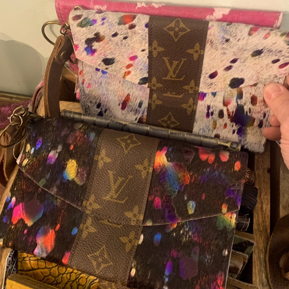 Upcycled clutches , I have a lot of different kinds. I closed my boutique. 5x 8
